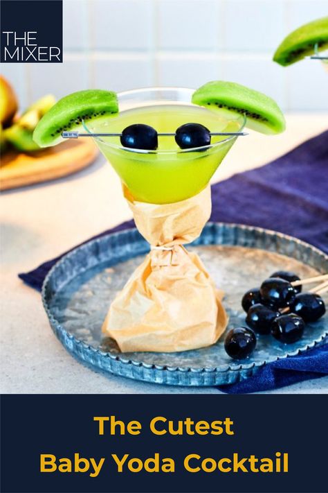 On days when you’re feeling cute, fruity, and a little quirky, you need to sip on a Baby Yoda Cocktail. This adorable drink, which is a kiwi-flavored Vodka Martini, is easy to make. No Jedi-level mixology skills required. 🥝🍸 Yoda Cocktail, Star Wars Drinks, Trendy Drinks, Skyy Vodka, Apple Cocktail, Melon Liqueur, Types Of Cocktails, Vodka Martini, Winter Cocktails