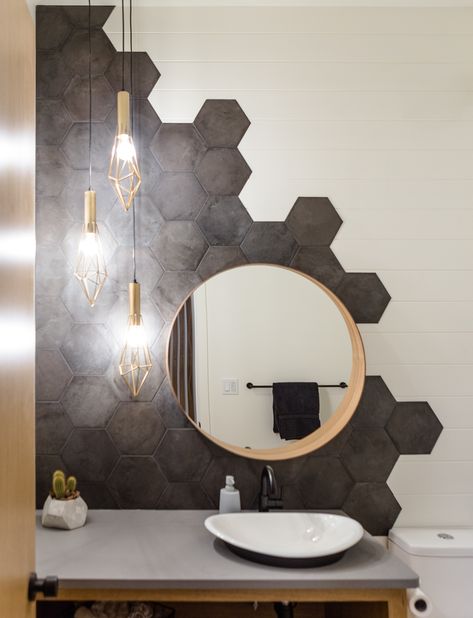 Unique geometric tile x shiplap design. Displayed on main floor half bath of stunning show home in Leduc Alberta. Bathroom Hexagon Backsplash, Hexagonal Interior Design, Hexagon Tile Bathroom Shower Wall Modern, Triangle Tile Bathroom, Unique Tile Shower Ideas, Octagon Tile Shower Wall, Half Tile Bathroom Walls, Half Bathroom Floor Ideas, Hexagon Wall Tile Bathroom