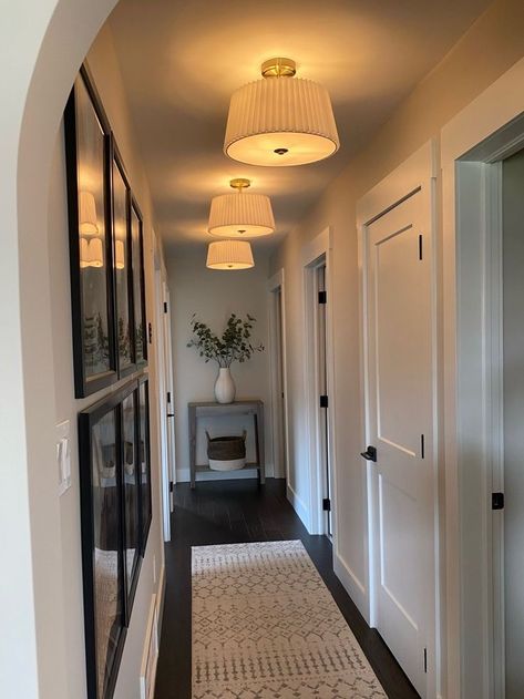 Light Over Gallery Wall, Earthy Hallway Ideas, Kitchen Entry Wall Decor, Apartment Lighting Design, End Of Long Hallway Ideas, Pendant Lights In Hallway, Short Hallway Decorating, Modern Boho Hallway, Define Space In Open Concept