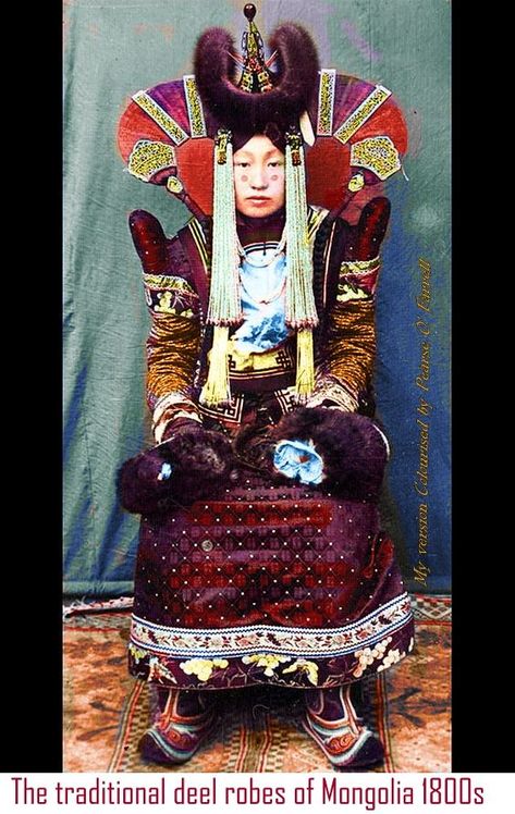 Feature of traditional Mongolian culture is the national costume, the deel, a long gown made of brightly coloured, usually patterned silk that buttons up to the neck on the right side. The deel is worn by both men and women, but men add a sash of contrasting colour around the waist. Following ancient rituals of respect for one’s elders. Buddhists visit the local temple or cairn (ovoo) to give thanks. My Version Colourised by Pearse O' Farrell Mongolian Culture, National Costume, Black White Photos, Long Gown, Historical Clothing, Give Thanks, Right Side, The National, Samurai Gear