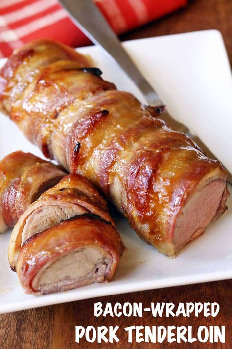 Wrapping pork tenderloin in bacon adds flavor and fat to the lean cut, making it juicy and flavorful. Bacon Wrapped Pork Tenderloin Recipes, Bacon Wrapped Pork Loin, Wrapped Pork Tenderloin, Bacon Wrapped Pork Tenderloin, Bacon Wrapped Pork, Wrapped In Bacon, Lean Pork, Baked Bacon, Kevin Bacon