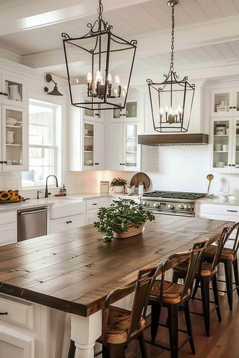 Illuminate Your Dining Area with Farmhouse Kitchen Lighting - Quiet Minimal Kitchen For Hosting, Farmhouse Open Kitchen And Living Room, Table In Middle Of Kitchen, Dining Area Lighting Ideas, Dining Area Lighting, Farmhouse Modern Kitchen, Kitchen With Table, Kitchen With Dining Table, Open Kitchen With Island