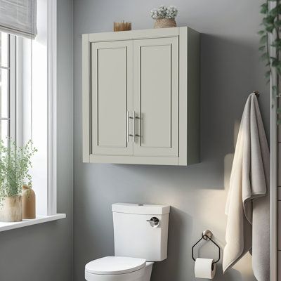 Maximize your space with style and functionality using our 26" H × 22" W × 8" D Wall Storage Cabinet. This elegant cabinet is designed to blend seamlessly into any room, offering a sophisticated storage solution for your home. With its adjustable shelves, you can customize the interior to fit your needs, whether you're organizing your bathroom essentials, kitchenware, or living room décor. Its compact design ensures you're making the most of every inch, while the durable construction promises lo Bathroom Wall Cabinet Ideas Storage, Above Toilet Storage Modern, Cabinets Over Toilet Ideas, Cabinet Above Toilet Storage Ideas, Bathroom Shelving Ideas Over Toilet, Bathroom Cabinet Above Toilet, Cabinet Over Toilet Ideas, Wall Cabinet Over Toilet, Storage Cabinet Above Toilet