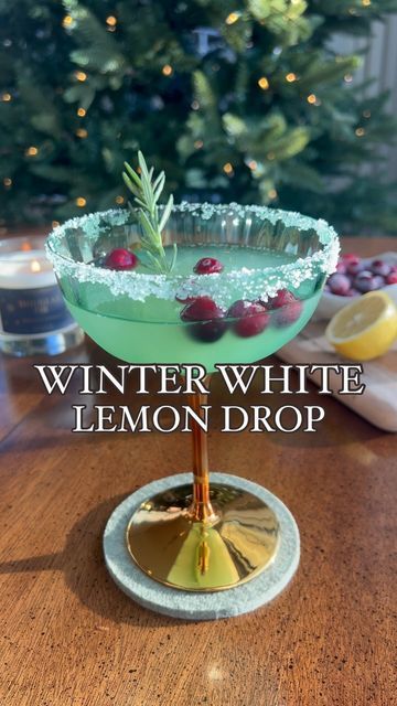 JORDAN | cocktails + mocktails on Instagram: "WINTER WHITE LEMON DROP

👉🏻Be sure to follow @kentuckyginger for more holiday cocktail inspo!

Here’s a fun and refreshing take on a classic Lemon Drop Martini that is perfect for your upcoming holiday gatherings! With the addition of white cranberry juice and limoncello, it’s sure to be a hit!

Here’s what you’ll need:

1.5 oz vodka @titosvodka 
3/4 oz. orange liquor @cointreau_us 
Fresh squeezed lemon juice (half of a lemon)
1.5 oz limoncello @pallinilimoncello 
1.5 oz white cranberry juice @oceansprayinc 

Start by rimming your martini glass with sugar. In a shaker, add all of the ingredients with ice and shake 20x with a smile. Strain into the prepared martini glass and garnish with a rosemary sprig and frozen cranberries. Cheers!
.
.
.
. Christmas Lemon Drop, Orange Liquor, White Cranberry Juice, Lemon Drop Martini, Squeezed Lemon, Frozen Cranberries, Winter Cocktails, Rosemary Sprigs, Holiday Cocktail