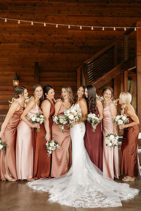 Bride in Lace Wedding Gown with Mismatched Bridesmaids in Shades of Red and Pink | White Floral Wedding Bouquets Burgundy And Peach Bridesmaid Dresses, Mismatch Red Bridesmaid Dresses, Bridesmaid Dresses Red Shades, Pink Shades Bridesmaids, Blush And Burgundy Bridesmaid Dresses, Mismatched Bridesmaid Dresses Burgundy, Maroon Mismatched Bridesmaid Dresses, Brown And Pink Wedding Colors, Cream And Maroon Wedding