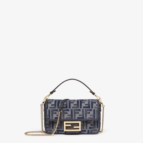 Small iconic Baguette bag made of chenille with the iconic FF motif in dark blue gradient tones, embellished with dark blue calfskin trim and decorated with an FF clasp. Featuring a front flap, magnetic clasp, one gray fabric-lined internal compartment with a calfskin pocket and gold-finish metalware. The bag can be carried by hand, or worn either on the shoulder or cross-body thanks to the calfskin handle and chain shoulder strap, both detachable. Made in Italy Dark Blue Gradient, Fall Fashion Shoes, Limousine Car, Fendi Baguette, Blue Gradient, Baguette Bag, Clutch Pouch, Gray Fabric, Boot Accessories