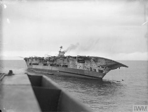 View from HMS HERMIONE of HMS ARK ROYAL after she had been hit, listing heavily to starboard. British Aircraft Carrier, Hms Ark Royal, Royal Navy Aircraft Carriers, German Submarines, Chief Petty Officer, Navy Aircraft Carrier, 13 November, Iwo Jima, British Aircraft