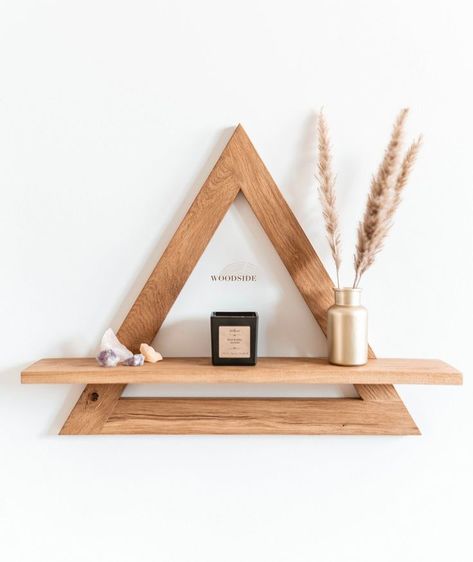 Hi! This amazing wooden shelf is perfect for your home if you are looking for that authentic rustic look. The TRIONE wall shelf is a model made of solid oak. The shelf is in a natural shade. Trione is a triangular shelf with one floor. The shelf looks beautiful on the wall thanks to its non-obvious form. Perfect for rooms decorated in an industrial, minimalist, rustic, boho and wabi sabi style, which is becoming more and more popular. The wooden triangular shelf Trione is a handmade produ... Small Wooden Furniture Ideas, Trending Woodworking Projects, Unusual Shelf Ideas, Creative Shelf Ideas, Small Wood Shelves, Wooden Wall Hanging Ideas, Wall Niche Ideas Entryway, Small Diy Wood Projects, Wooden Crafts Ideas