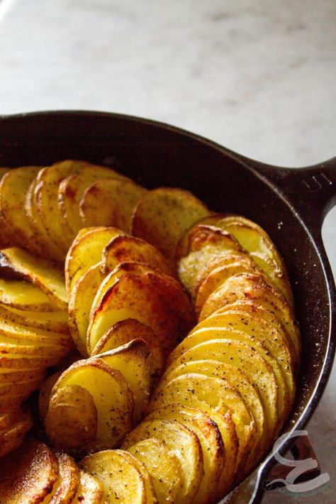 All you need for skillet potatoes is five ingredients, and two of them are salt and pepper! This recipe for skillet potatoes is one of the fastest ways to create an impressive side from pantry staples. Potato In Cast Iron Skillet, Cast Iron Dishes Meals, Cast Iron Skillet Potatoes And Onions, Cast Iron Skillet Sweet Potatoes, Cast Iron Potatoes Recipes, Potato Cast Iron Recipes, Cast Iron Skillet Potatoes Oven, Roasted Potatoes In Cast Iron Skillet, Cast Iron Vegetables