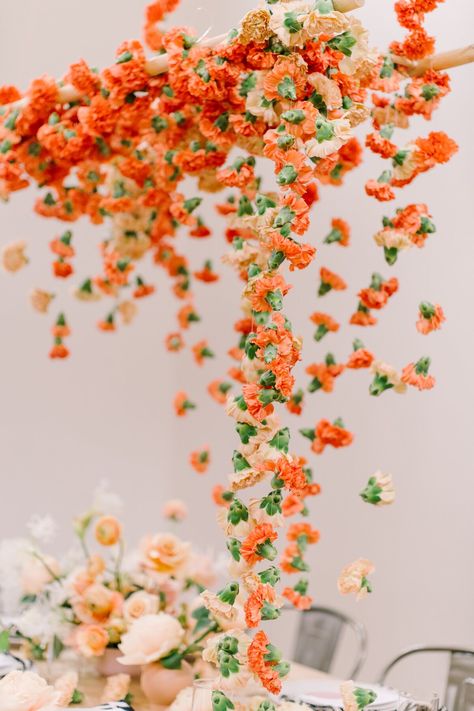 orange carnations suspended above table Orange Carnations, Affordable Wedding Flowers, Inexpensive Wedding Flowers, Expensive Flowers, Tulip Wedding, Flowers Hanging, Garden Bridal Showers, Bridal Shower Tables, Unique Wedding Flowers