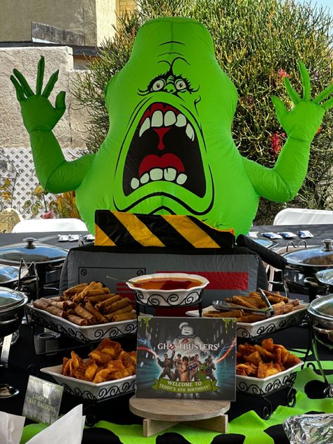 Main food table with Slimer centerpiece Ghostbusters Party Food, Ghostbuster Party, Party Food Table, Ghostbusters Party, Main Food, Chili Cook Off, Cook Off, Food Table, Ghostbusters