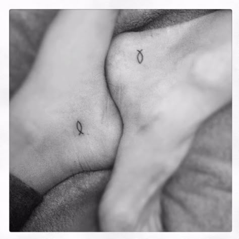 Mother daughter tattoo. Same placement . I'll have 'I'll love you forever . I'll like you for always.' My moms will be 'as long as I'm living , my baby you'll be.' MINUS THE JESUS FISH Biblical Mother Daughter Tattoos, Icthus Tattoo, Maching Tattoos Mother Daughter, Matching Tattoos With Dad, Christian Couple Tattoos, Christian Fish Tattoos, Tattoo Ideas For Female, Brother Tattoo, Faith Tattoos