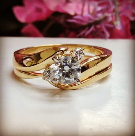 Solitaire Swirl Diamond Engagement Ring & Wedding Band Bridal Set in Yellow Gold  https://mdcdiamonds.com/engagementdetails.cfm?Stock=ES1894YG&Country=US  #diamondsnewyork #swirl #solitaire #bridalset #3stone #threestone #petitediamondring #anniversaryring #mdcdiamondsnewyork #engagementring #weddingband #yellowgold #interlocking #intertwined #shesaidyes Engagement Ring For Bride Indian Gold, Kerala Engagement Ring With Name, Engagement Ring For Bride Indian, Victorian Gold Rings For Marriage, Interlocking Wedding Rings Sets, Yellow Gold Meenakari Ring For Gift, Indian Girl Engagement Ring, Gold Ring Design For Women Indian Traditional, Engagement Ring For Bride