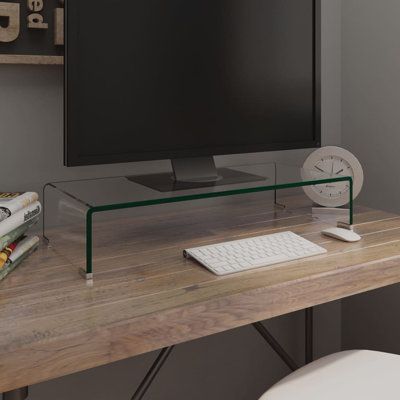 This practical Zeigler TV Stand has tempered glass construction. The sleek, streamlined design of this understated TV unit will add a modern touch to your living space. This glass shelf can be used as a TV stand or riser for your desktop monitor, television, laptop and other multimedia devices. With the glass shelf raising the monitor, you will have a better view of the screen while sitting comfortably, which helps to reduce the strain and discomfort on your neck or back. space underneath can ac Tv Regal, Glass Tv Stand, Suport Tv, Monitor Riser, Console Tv, Support Tv, Media Furniture, Mobile Tv, Streamline Design