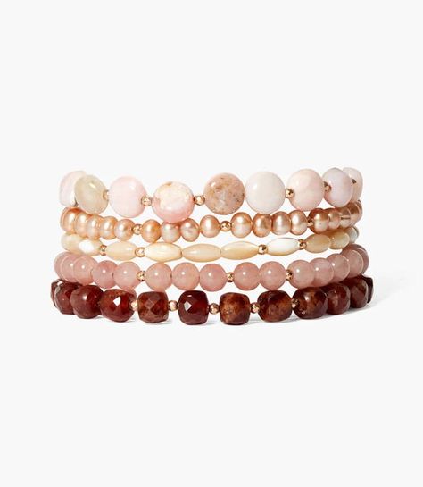 This versatile Chan Luu Beaded Wrap Bracelet features a multi bead strand that can be styled as both a wrap bracelet or necklace. Elevate your look with this unique and functional accessory. Expertly crafted for effortless wear. Material: Hessonite, strawberry quartz, natural mother of pearl, labradorite, 18k gold plated over sterling silver Dimensions: 32"L, extender 2", stones 0.25" Weight: 1.18 oz. Imported Pink Wrap, Pearl Necklace Earrings, Sterling Silver Anklet, Beaded Wrap Bracelets, Beaded Wraps, Silver Anklets, Birthstone Bracelets, Strawberry Quartz, Pearl Gemstone