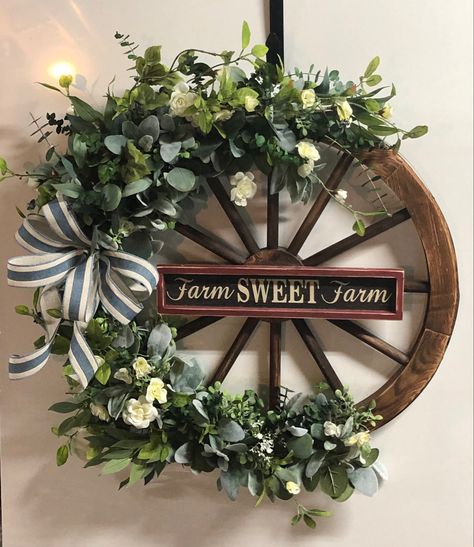 Wagon Wheel Wreath, Decorating Small Spaces Apartments, Wagon Wheel Decor, Mantle Ideas, Wagon Wheels, Apartment Decorating Ideas, Wheel Decor, Summer Door Hanger, Door Wreaths Diy