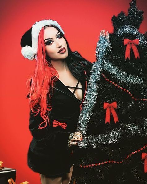 Ash Costello on Instagram: "Have a creepy Christmas and a very scary new year! What’s your favorite part about the holidays!? Mine is drinking wine and doing absolutely NOOOOOOOTHING…. 📸 @jeremysaffer" Creepy Christmas Photoshoot, Kawaii Spooky, Ash Costello, Gothic Christmas, Band Quotes, Creepy Christmas, Christmas Shoot, Drinking Wine, Santa Helper