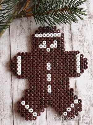 Perler Beads Gingerbread Man Ornament Fused Beads, Gingerbread Man Christmas Tree, Hama Beads Christmas, Man Christmas Tree, Christmas Perler Beads, Beaded Christmas Decorations, Gingerbread Man Christmas, Fuse Bead Patterns, Christmas Gingerbread Men