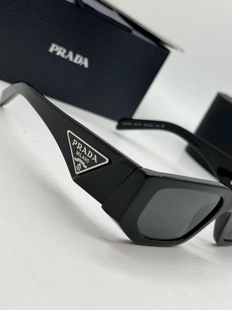 Brand new Prada PR09ZS Sunglasses in Black.Featuring a black rectangular acetate frame with dark grey lenses.Silver metal plaque Prada logos on temples.Measures 54-18-140. Unisex.100% authentic and unworn.Made in Italy.Box, case, cloth and paperwork included. Retail price $560. Visual Wishlist, Prada Shades, Prada Aesthetic, Stylish Glasses, Men's Eyeglasses, Metal Plaque, Grey Lenses, Jimmy Choo, Dark Grey