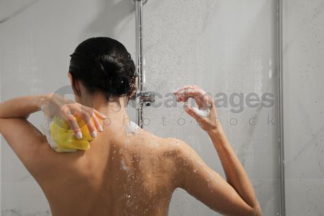 Young woman with mesh pouf taking shower at home, back view Relaxing Bath, Young Woman, Stock Photography, Photo Image, Stock Images, Mesh, Bath, Stock Photos, Shower