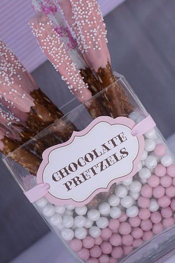 why haven't i thought of this version of choco-pretzels!  genius. Snack Tables, Chocolate Pretzel Rods, Dipped Pretzel Rods, Dipped Pretzels, Chocolate Covered Pretzel Rods, Black Poodle, Pretzel Dip, Pretzel Rods, Food Decor