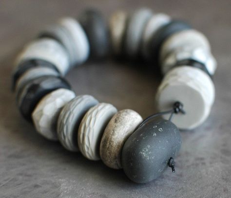 Pebble and Grey bracelet Genevieve Williamson, Polyclay Ideas, Polymer Jewellery, Grey Bracelet, Black Polymer Clay, Clay Bracelets, Gray Bracelet, Polymer Clay Bracelet, Clay Bracelet