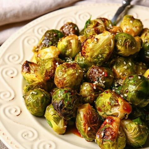 Mastering the Longhorn Steakhouse Crispy Brussels Sprouts Recipe: A Detailed Guide - The Endless Appetite Longhorn Steakhouse, Crispy Brussel Sprouts, Calabrian Chili, White Platter, Fancy Restaurants, Brussels Sprouts Recipe, Cooking Instructions, Brussel Sprouts, Copycat Recipes