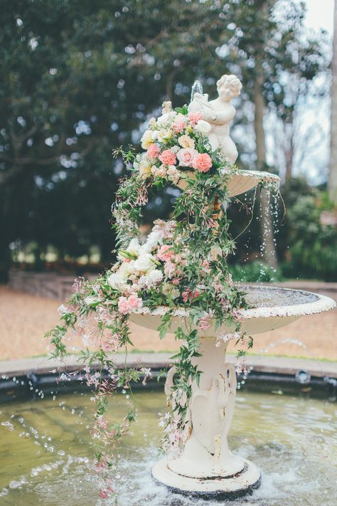 Fountain With Flowers Wedding, Fountain Florals, Fountain Flowers Wedding, Wedding Arbors, Garden Theme Wedding, Secret Garden Wedding, Lily Wedding, Elegant Wedding Inspiration, Greenhouse Wedding