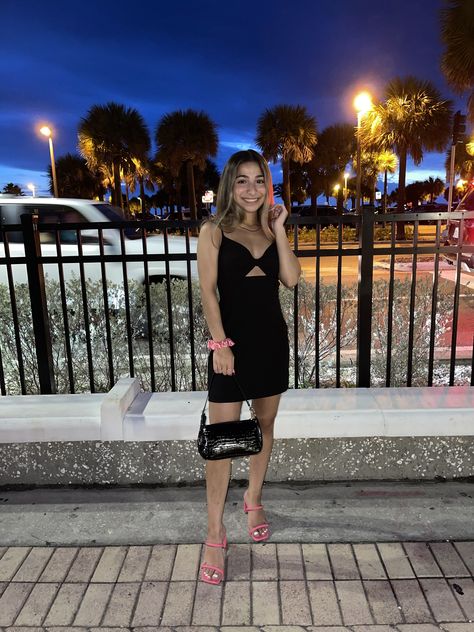 Bright Heels With Black Dress, Black Dress With Pop Of Color Heels, Black Dress Pink Heels Hoco, Black Prom Dress Pink Heels, Black Dress With Pink Heels, Black Dress Pink Shoes, Black Dress Pink Heels, Black Dress And Pink Heels, Short Black Dress Outfit