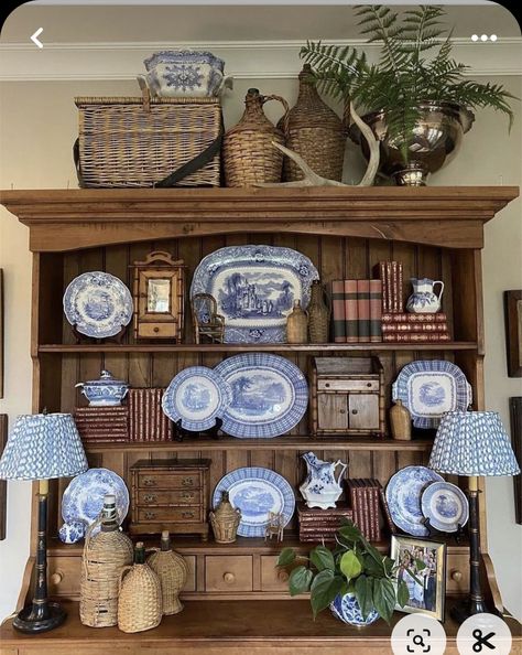 Breakfront Cabinet Styling, Blue And White Dishes Display, Baskets On Top Of Hutch, Antique Hutch Decorating Ideas, China Cabinet Display Ideas, Living Room Hutch Decorating Ideas, Top Of China Cabinet Decor, Top Of Hutch Decor, Style A China Cabinet