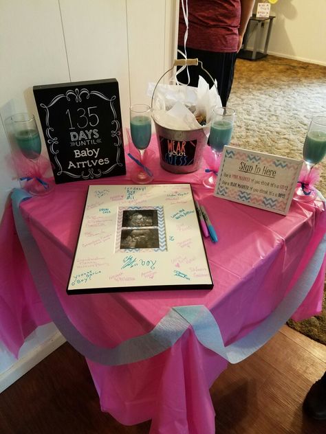 Gender Reveal sign in table Gender Reveal Sign In Ideas, Baby Shower Sign In Table, Gender Reveal Table Set Up Outside, Gender Reveal Sign Ideas, Gender Reveal Set Up, Gender Reveal Table Set Up, Gender Reveal Games Activities, Gender Reveal Activities, Gender Reveal Party Gifts