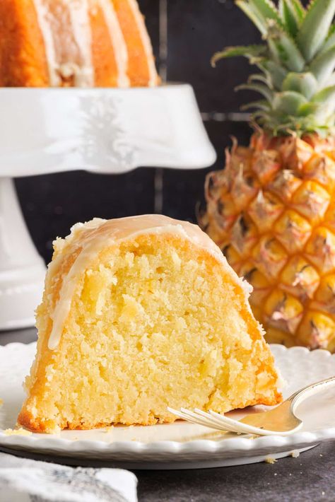 This pineapple pound cake is a super simple recipe to whip up that uses pantry staples and will have your taste buds going crazy! It's drizzled with a sweet pineapple glaze and baked to perfection. Pineapple Pound Cake Recipe, Pineapple Pound Cake, Banana Bread Recipe Easy Moist, Pineapple Cakes, Homemade Pound Cake, Pineapple Cake Recipe, Pineapple Glaze, Pineapple Dessert Recipes, Glaze For Cake