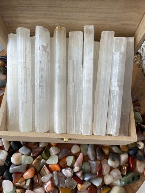 "5.5-6.5 inches There are many different ways you can use Selenite crystals. A simple energy shifting technique you can do at work, or in your home, is to sit in a chair while placing your bare feet on a selenite wand or stone. As you sit quietly, breathe and feel the energy of the Earth under you feet. Allow yourself to relax and let go. Within 15 minutes, clarity and balance will be restored within your body. To cleanse your aura, take a selenite wand and use it like it's an eraser. Comb the c Selenite Crystal Wands, Selenite Crystals, Crystal Wands, Selenite Wand, Aura Cleansing, Selenite Wands, Energy Clearing, Removing Negative Energy, Selenite Crystal