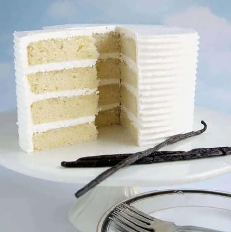 This is the quintessential vanilla layer cake. There are a few special touches that make this cake the best vanilla cake you'll ever taste. Learn how to assemble a professional looking layer cake with step by step instructions and a video. #how to #from scratch #homemade #best #moist #perfect #buttercream #bakery style Bakery Style Vanilla Cake Recipe, Bakery Style Vanilla Cake, Best Vanilla Layer Cake Recipe, Vanilla Layered Cake, Vanilla Butter Cake Recipe, Vanilla Layer Cake Recipe, 4 Layer Cake, The Best Vanilla Cake, Best Vanilla Cake