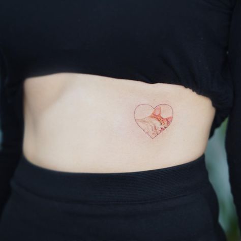 cute cat tattoo design on ribs Ink Cat Tattoo, Cat Rib Tattoo, Red Cat Tattoo, Bats On Ribs Tattoo, Kitty Heart Tattoo, Tattoos On Ribs, Cat With Strawberry Tattoo, Minimal Kitten Tattoo, Cat Tattoo Design