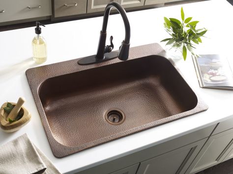 installed angelico copper drop-in sink with white countertop and rustic bronze pfister faucet Kitchen Sink Remodel, Copper Kitchen Sink, Drop In Kitchen Sink, Fruit And Vegetable Storage, Drop In Sink, Popular Kitchens, Bowl Kitchen Sink, Single Bowl Kitchen Sink, Antique Kitchen