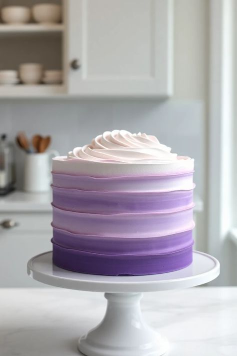 Looking to sweeten up your next celebration? Check out these 25 gorgeous lilac cake ideas that are sure to impress! From stunning ombre buttercream textures to artistic decorations, these cakes add an elegant flair to any event, including birthdays, weddings, or spring parties. Find your inspiration to create a cake that not only tastes delicious but also dazzles at first sight! The blend of floral designs and violet hues guarantees a show-stopping centerpiece for your sweet celebrations. Lilac Graduation Cake, Watercolor Cake Design, Sweet 16 Cake Ideas Purple, Ombre Purple Cake, Lilac Cake Ideas, Light Purple Cake, Lilac Birthday Cake, Lavender Birthday Cake, Lilac Cakes