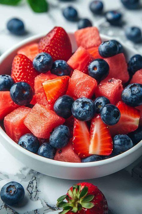 Bright bowl of watermelon, strawberries, and blueberries with mint, ready for summer. 4th Food Ideas, 4th Of July Menu Ideas, Watermelon Fruit Bowl, July 4th Appetizers, Watermelon Fruit Bowls, 4th Of July Dinner, Watermelon Snack, Recipes 4th Of July, Watermelon Fruit Salad