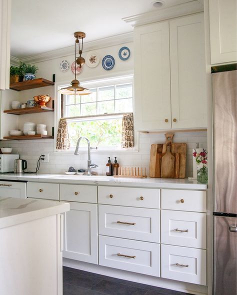 Since the beginning of the year I’ve just been doing whatever I can to avoid painting these cabinets 😛 Honestly the plate walls are working! Linking the supplies I used in this post in the LTK app, plus all the other sources. 2019 kitchen reno still going strong and I’m doing what I can to keep from being bored with it! #liketkit #LTKHome @shop.ltk https://liketk.it/4JVMZ Taking Cabinet Doors Off In Kitchen, Erin Napier Kitchen, Plate Walls, Craftsman Style Kitchen, Erin Napier, Kitchen White, Kitchen Reno, Style Kitchen, Renovation Ideas