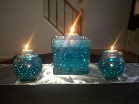 My non-floral centerpieces. Pics and opinions please? :  wedding centerpieces nonfloral IMG 20111030 134010 Teal Centerpieces, Centerpieces On A Budget, Teal Candles, Ceremony Backdrop Indoor, Fall Themed Wedding, Non Floral Centerpieces, Colourful Stones, Country Wedding Reception, Backyard Wedding Decorations