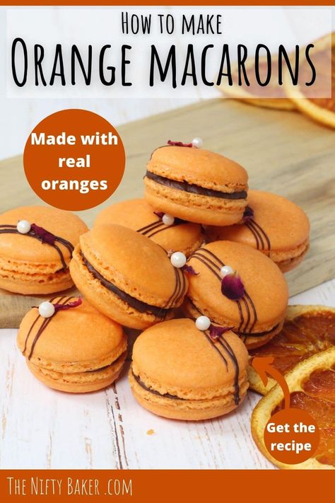 Orange macarons filled with dark chocolate ganache and orange curd sitting on a wooden chopping board with dried orange slices. Chocolate Orange Macarons, Orange Macarons, Orange Curd, Orange Buttercream, Chocolate Macaron, Decorative Cakes, Dark Chocolate Ganache, Macaron Cookies, Curd Recipe