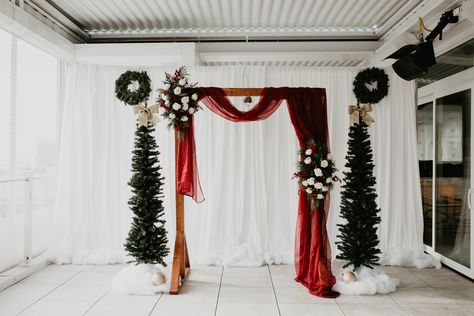 Christmas Wedding DIY Arch Christmas Wedding Balloon Arch, Winter Wedding Ceremony Arch, Micro Christmas Wedding, Christmas Wedding Ceremony Backdrop, Christmas Wedding Arch Ceremony Backdrop, Christmas Wedding Alter, Christmas Wedding Arch Ideas, Christmas Wedding Arch, Christmas Church Wedding