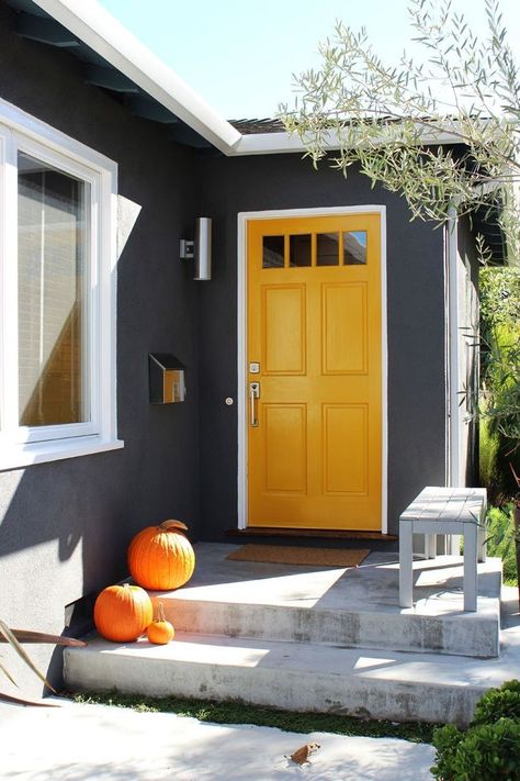 Front Entry Doors That Make A Strong First Impression Bold Front Door, Yellow Front Doors, Gray House, Yellow Door, Suburban House, White Door, Retro Renovation, Yellow Doors, Grey Houses