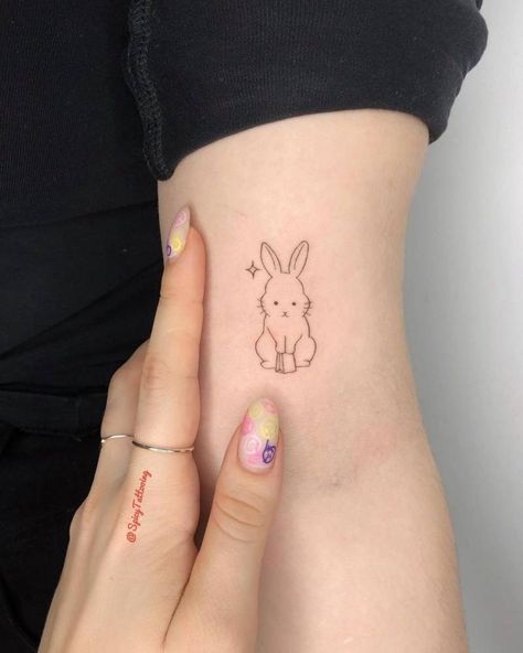 Minimalist Bunny Tattoo, Ulzzang Tattoo, Bunny Tattoo Ideas, Bunny Tattoo, Rabbit Tattoo, Bunny Tattoos, Rabbit Tattoos, Cute Tiny Tattoos, Lily Tattoo