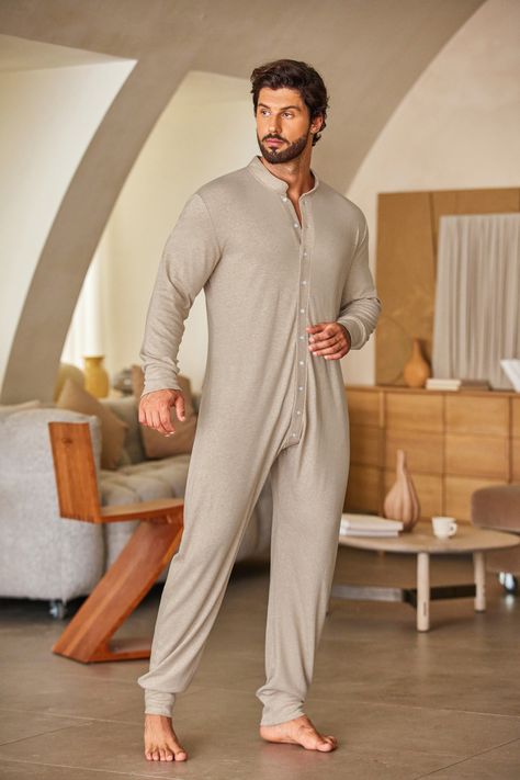 This one-piece thermal union suit is made to adapt to environmental temperature changes so that you may be comfortable all day. Onesie with long sleeves and a crew collar made of double-layer thermal material. Full-button closure. Easy to put on and take off with a button-up front. #men #onesies #thermal Union Suit Men, Union Suit, Mens Thermals, Suit Men, Long John, One Piece Pajamas, Men Fashion, Double Layer, Onesies