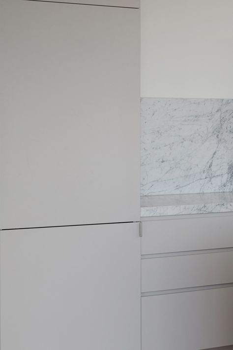 Laminex Oyster Grey cabinets pair well with a marble benchtop and splashback. Design: Chris Connell | Cabinet Maker: Matt Clarke Kitchen & Design | Photography: Willem-Dirk du Toit Oyster Grey Laminex Kitchen, Laminex Oyster Grey, Polytec Oyster Grey Kitchen, Oyster Grey Kitchen Cabinets, Laminex Kitchen Australia, Oyster Grey Kitchen, Marble Benchtop Kitchen, Carrara Kitchen, Latest Kitchen Ideas