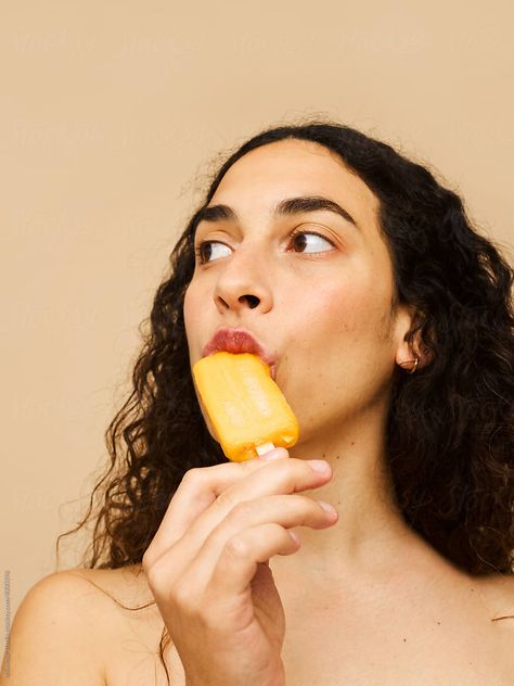 "Isolated Portrait Eating Icecream" by Stocksy Contributor "Ohlamour Studio" - Stocksy Eating Portrait, Eating A Popsicle Pose, Popsicle Reference, Ice Cream Portrait Photography, Eating Ice Cream Pose, People With Ice Cream Photography, Eating Ice Cream Pictures, People Eating Ice Cream Photography, Ice Cream Photography