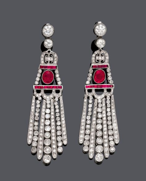 BURMA RUBY AND DIAMOND EAR PENDANTS, ca. 1920.  Platinum.  Art-Déco ear pendants, each set with 1 oval Burma ruby totalling ca. 1.70 ct, not heated, between 2 ruby-set lines, 4 circular-cut diamonds weighing ca. 1.30 ct, and suspending a fringe of single- and circular-cut diamonds weighing ca. 2.80 ct. L ca. 6,3 cm. Tapered Fringe, Art Deco Jewelry 1920s, Bijoux Art Deco, Ruby Set, Burmese Ruby, Diamond Pendent, Jeweled Earrings, Ruby Earrings, Ruby Jewelry