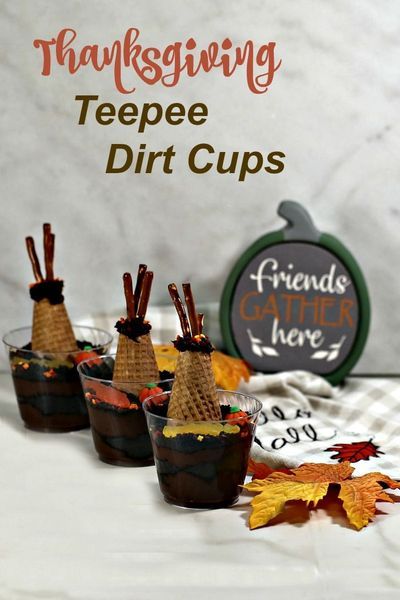 Three dirt desert cups with pumpkin and fall leaves. These Thanksgiving dirt are a fun way to teach your child a little about nomadic Native American tribes and give them a tasty snack at the same time. #thanksgiving #dirtcups #teepees #funwithfood Thanksgiving Dirt Pudding, Thanksgiving Pudding Cups, Dirt Cup Recipe, Dirt Desert, Dirt Cups Dessert, Dirt Cups Recipe, Dirt Pudding Cups, Pudding Cup Recipes, Dirt Cake Recipes