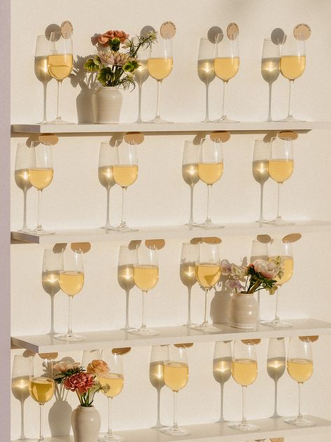 Sip, Celebrate, Seating! 🥂✨ A Champagne Shelf Wall does double duty as a seating chart at this wedding extravaganza. Bubbly bottles and personalized tags guide guests to their seats in style. A toast to love, laughter, and a dash of champagne chic! 🍾💜 Champagne Shelf, Champagne Seating Chart, Champagne Seating, Champagne Wall, Bridal Shower Inspo, Wedding Champagne, Reception Inspiration, Wedding Reception Inspiration, Shelf Wall